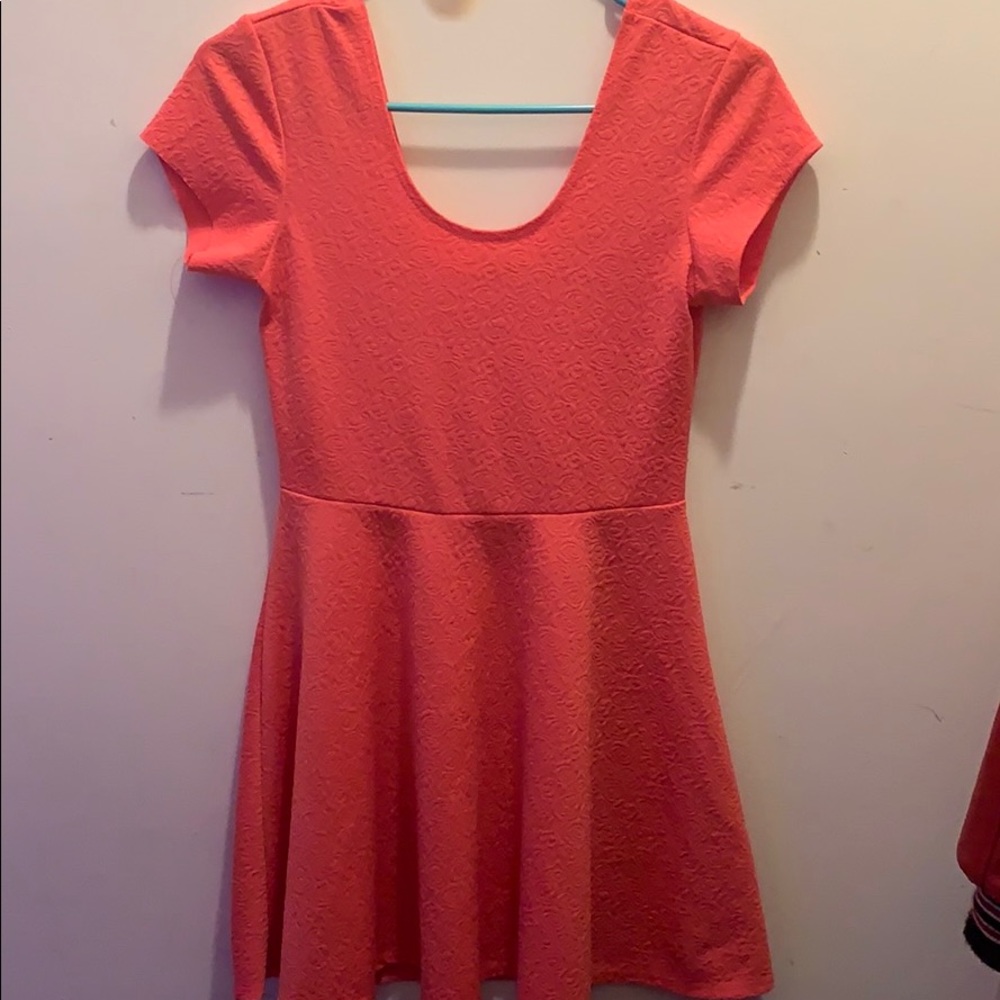 A dress (missing sewing on 1 sleeve)